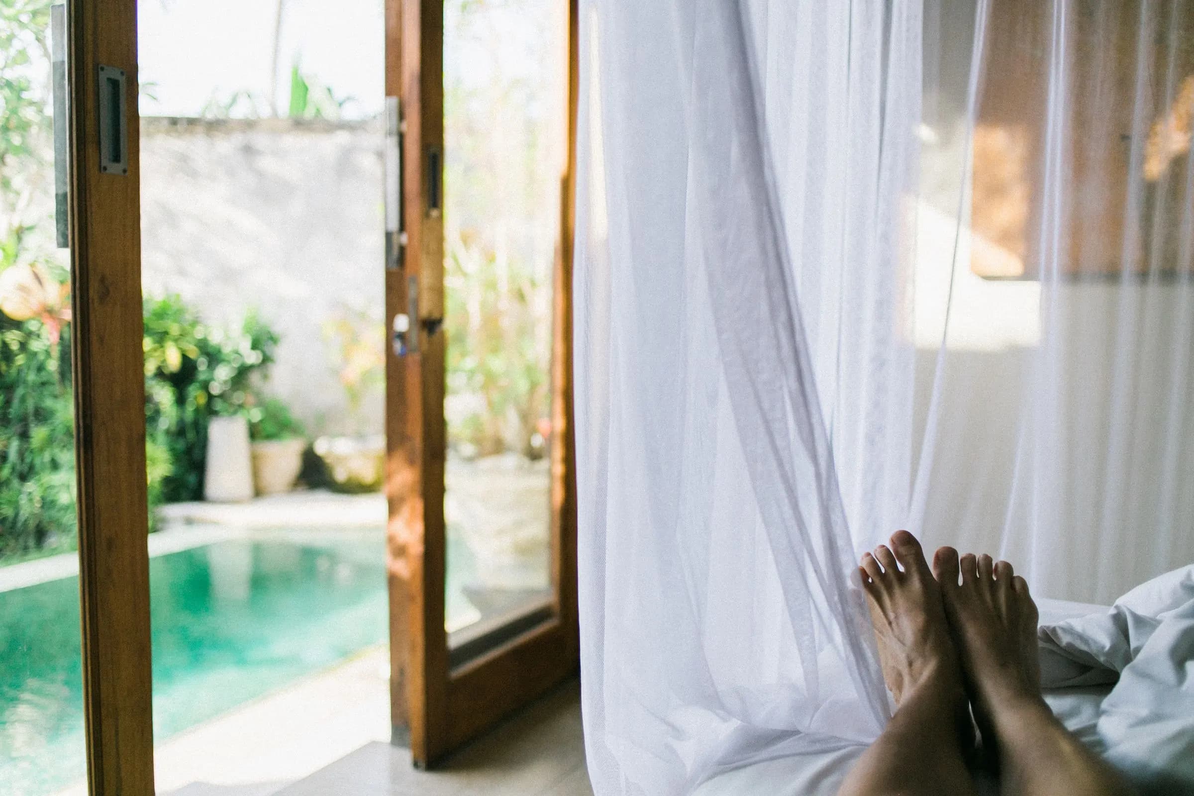 View from a villa bedroom to a private pool